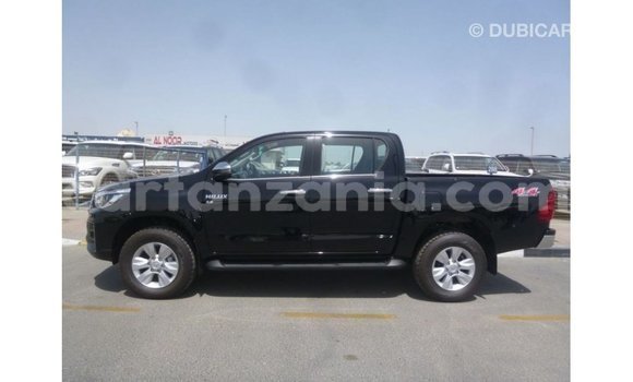 Nunua Imported Toyota Hilux Nyeusi Gari ndani ya Import - Dubai nchini Arusha Nunua Imported Toyota Hilux Nyeusi Gari ndani ya Import - Dubai nchini Arusha