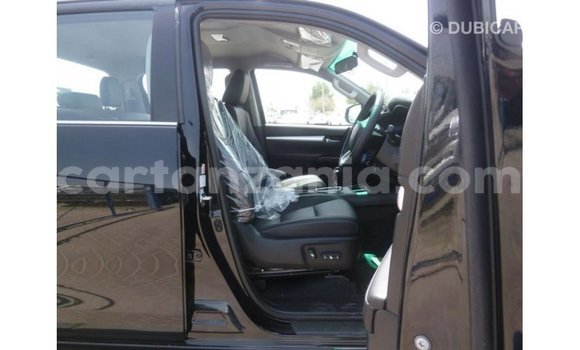 Nunua Imported Toyota Hilux Nyeusi Gari ndani ya Import - Dubai nchini Arusha Nunua Imported Toyota Hilux Nyeusi Gari ndani ya Import - Dubai nchini Arusha
