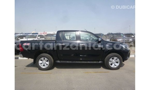 Nunua Imported Toyota Hilux Nyeusi Gari ndani ya Import - Dubai nchini Arusha Nunua Imported Toyota Hilux Nyeusi Gari ndani ya Import - Dubai nchini Arusha