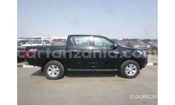 Nunua Imported Toyota Hilux Nyeusi Gari ndani ya Import - Dubai nchini Arusha Nunua Imported Toyota Hilux Nyeusi Gari ndani ya Import - Dubai nchini Arusha