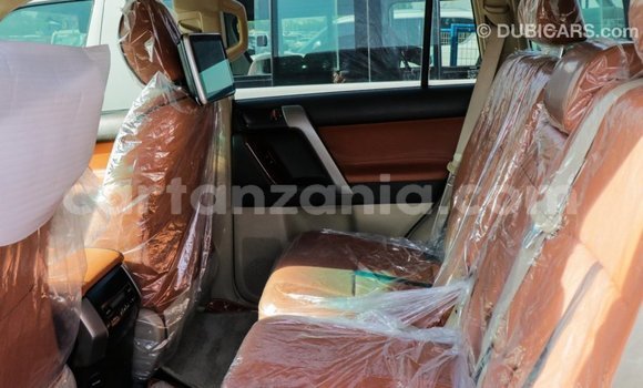 Buy Import Toyota Prado Red Car in Import - Dubai in Arusha Buy Import Toyota Prado Red Car in Import - Dubai in Arusha