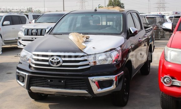 Nunua Imported Toyota Hilux Nyeusi Gari ndani ya Import - Dubai nchini Arusha Nunua Imported Toyota Hilux Nyeusi Gari ndani ya Import - Dubai nchini Arusha