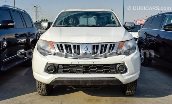 Buy Import Mitsubishi L200 White Car in Import - Dubai in Arusha Buy Import Mitsubishi L200 White Car in Import - Dubai in Arusha