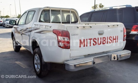 Buy Import Mitsubishi L200 White Car in Import - Dubai in Arusha Buy Import Mitsubishi L200 White Car in Import - Dubai in Arusha