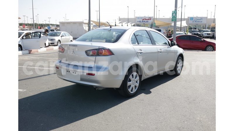 Big with watermark mitsubishi lancer arusha import dubai 7660