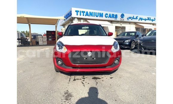 Buy Import Suzuki Swift Red Car in Import - Dubai in Arusha Buy Import Suzuki Swift Red Car in Import - Dubai in Arusha