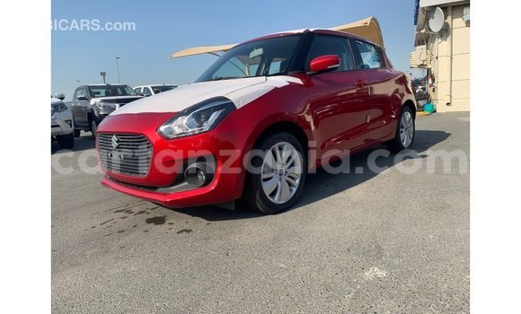 Buy Import Suzuki Swift Red Car in Import - Dubai in Arusha Buy Import Suzuki Swift Red Car in Import - Dubai in Arusha