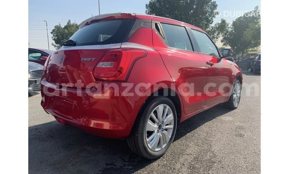 Buy Import Suzuki Swift Red Car in Import - Dubai in Arusha Buy Import Suzuki Swift Red Car in Import - Dubai in Arusha