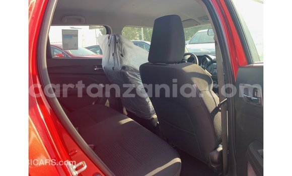 Buy Import Suzuki Swift Red Car in Import - Dubai in Arusha Buy Import Suzuki Swift Red Car in Import - Dubai in Arusha