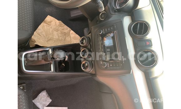 Buy Import Suzuki Swift Red Car in Import - Dubai in Arusha Buy Import Suzuki Swift Red Car in Import - Dubai in Arusha