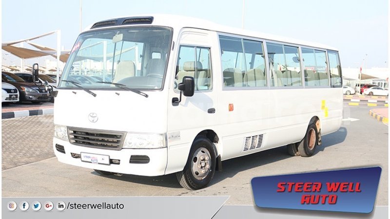 Big with watermark toyota coaster arusha import dubai 7749