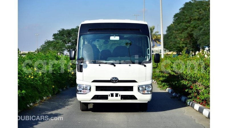 Big with watermark toyota coaster arusha import dubai 7860