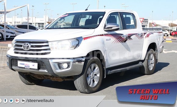 Nunua Imported Toyota Hilux Nyeupe Gari ndani ya Import - Dubai nchini Arusha Nunua Imported Toyota Hilux Nyeupe Gari ndani ya Import - Dubai nchini Arusha