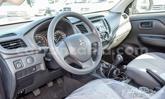 Buy Import Mitsubishi L200 White Car in Import - Dubai in Arusha Buy Import Mitsubishi L200 White Car in Import - Dubai in Arusha