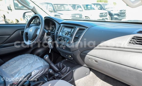 Buy Import Mitsubishi L200 White Car in Import - Dubai in Arusha Buy Import Mitsubishi L200 White Car in Import - Dubai in Arusha