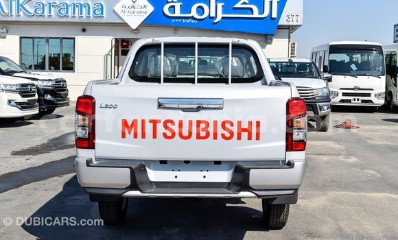 Buy Import Mitsubishi L200 White Car in Import - Dubai in Arusha Buy Import Mitsubishi L200 White Car in Import - Dubai in Arusha