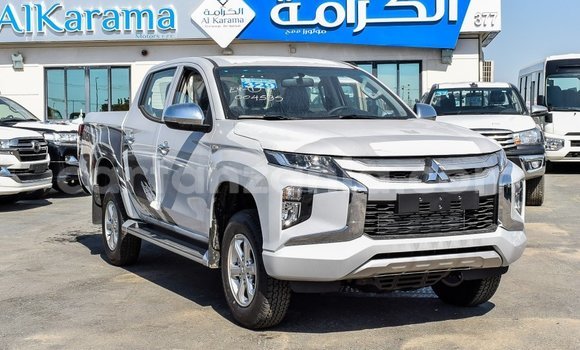 Buy Import Mitsubishi L200 White Car in Import - Dubai in Arusha Buy Import Mitsubishi L200 White Car in Import - Dubai in Arusha