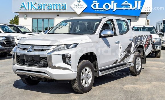 Buy Import Mitsubishi L200 White Car in Import - Dubai in Arusha Buy Import Mitsubishi L200 White Car in Import - Dubai in Arusha