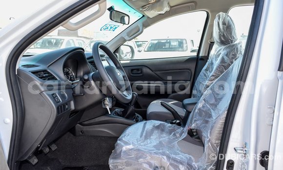 Buy Import Mitsubishi L200 White Car in Import - Dubai in Arusha Buy Import Mitsubishi L200 White Car in Import - Dubai in Arusha