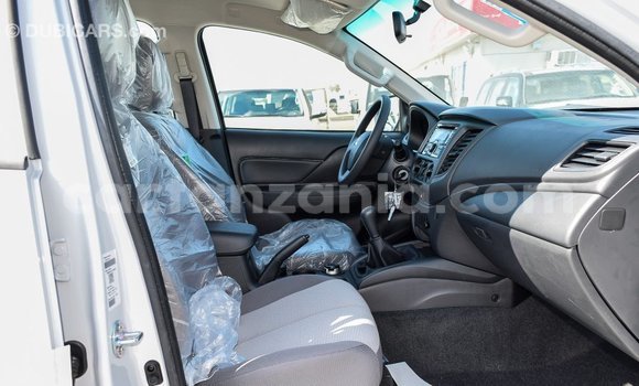 Buy Import Mitsubishi L200 White Car in Import - Dubai in Arusha Buy Import Mitsubishi L200 White Car in Import - Dubai in Arusha