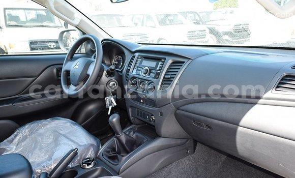 Buy Import Mitsubishi L200 White Car in Import - Dubai in Arusha Buy Import Mitsubishi L200 White Car in Import - Dubai in Arusha