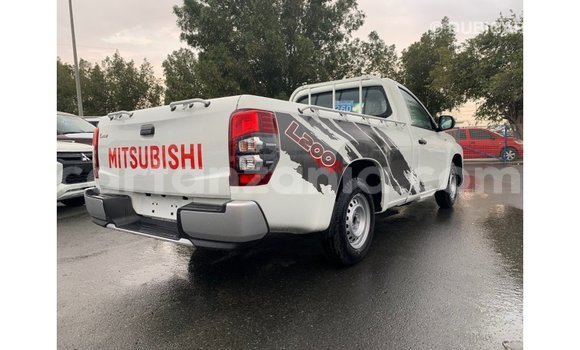 Buy Import Mitsubishi L200 White Car in Import - Dubai in Arusha Buy Import Mitsubishi L200 White Car in Import - Dubai in Arusha