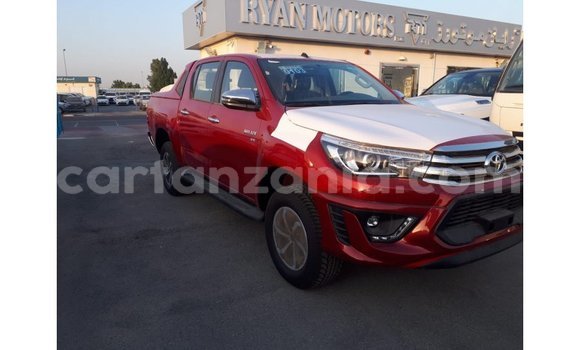 Buy Import Toyota Hilux Red Car in Import - Dubai in Arusha Buy Import Toyota Hilux Red Car in Import - Dubai in Arusha