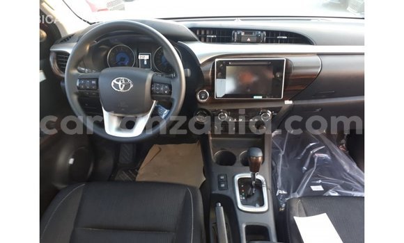 Buy Import Toyota Hilux Red Car in Import - Dubai in Arusha Buy Import Toyota Hilux Red Car in Import - Dubai in Arusha