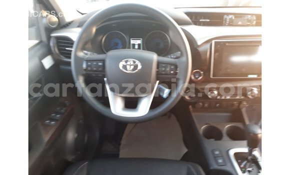 Buy Import Toyota Hilux Red Car in Import - Dubai in Arusha Buy Import Toyota Hilux Red Car in Import - Dubai in Arusha