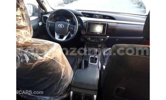 Buy Import Toyota Hilux Red Car in Import - Dubai in Arusha Buy Import Toyota Hilux Red Car in Import - Dubai in Arusha