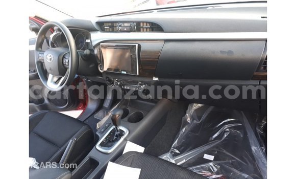 Buy Import Toyota Hilux Red Car in Import - Dubai in Arusha Buy Import Toyota Hilux Red Car in Import - Dubai in Arusha