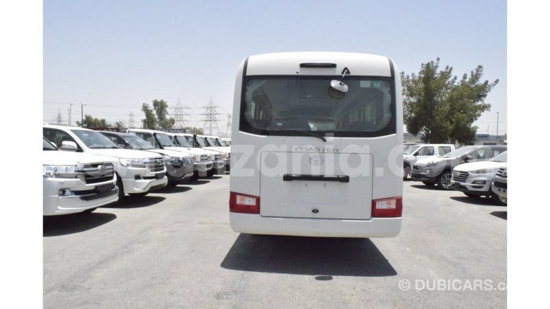 Big with watermark toyota coaster arusha import dubai 8224