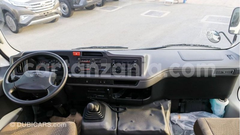 Big with watermark toyota coaster arusha import dubai 8228