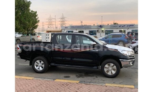 Nunua Imported Toyota Hilux Nyeusi Gari ndani ya Import - Dubai nchini Arusha Nunua Imported Toyota Hilux Nyeusi Gari ndani ya Import - Dubai nchini Arusha