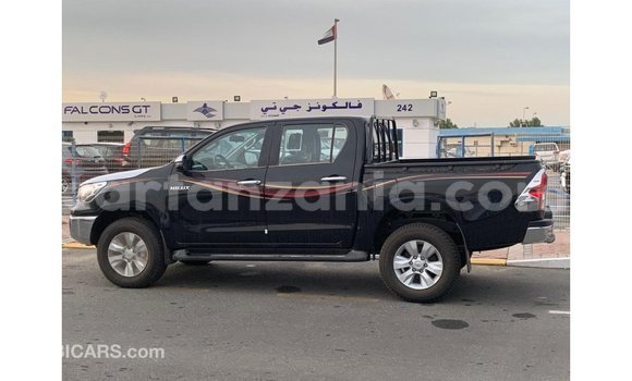 Nunua Imported Toyota Hilux Nyeusi Gari ndani ya Import - Dubai nchini Arusha Nunua Imported Toyota Hilux Nyeusi Gari ndani ya Import - Dubai nchini Arusha