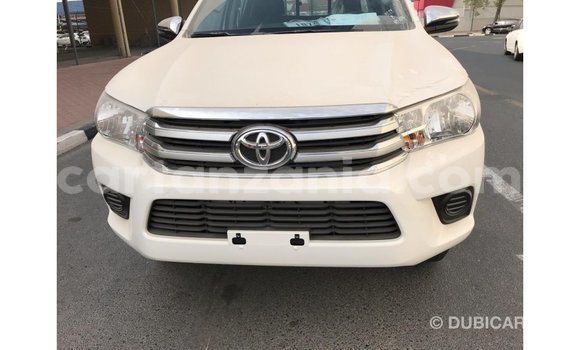 Nunua Imported Toyota Hilux Nyeupe Gari ndani ya Import - Dubai nchini Arusha Nunua Imported Toyota Hilux Nyeupe Gari ndani ya Import - Dubai nchini Arusha