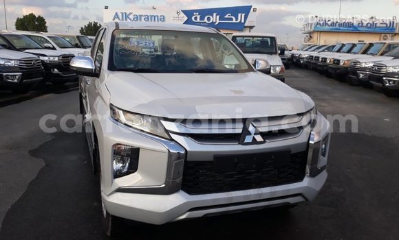 Buy Import Mitsubishi L200 White Car in Import - Dubai in Arusha Buy Import Mitsubishi L200 White Car in Import - Dubai in Arusha