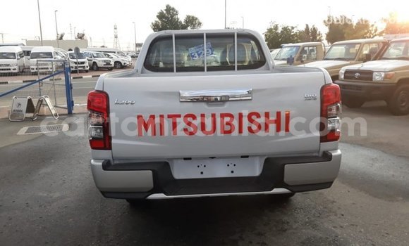 Buy Import Mitsubishi L200 White Car in Import - Dubai in Arusha Buy Import Mitsubishi L200 White Car in Import - Dubai in Arusha