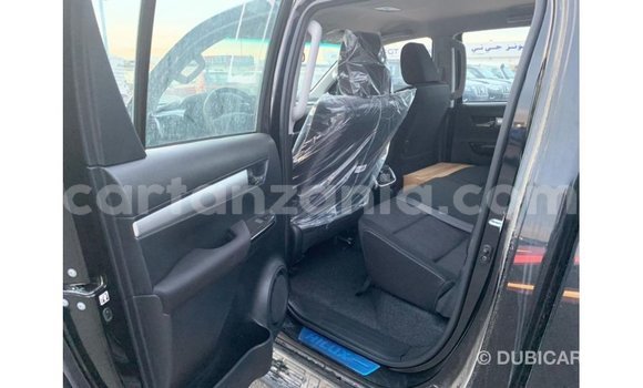 Nunua Imported Toyota Hilux Nyeusi Gari ndani ya Import - Dubai nchini Arusha Nunua Imported Toyota Hilux Nyeusi Gari ndani ya Import - Dubai nchini Arusha