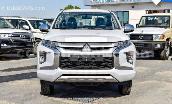 Buy Import Mitsubishi L200 White Car in Import - Dubai in Arusha Buy Import Mitsubishi L200 White Car in Import - Dubai in Arusha