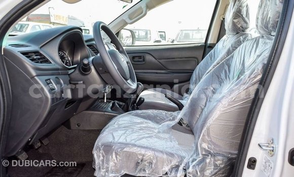 Buy Import Mitsubishi L200 White Car in Import - Dubai in Arusha Buy Import Mitsubishi L200 White Car in Import - Dubai in Arusha