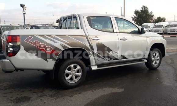 Buy Import Mitsubishi L200 White Car in Import - Dubai in Arusha Buy Import Mitsubishi L200 White Car in Import - Dubai in Arusha