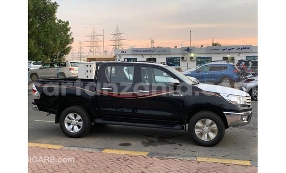 Nunua Imported Toyota Hilux Nyeusi Gari ndani ya Import - Dubai nchini Arusha Nunua Imported Toyota Hilux Nyeusi Gari ndani ya Import - Dubai nchini Arusha