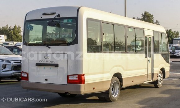 Nunua Imported Toyota Coaster Nyeupe Gari ndani ya Import - Dubai nchini Arusha Nunua Imported Toyota Coaster Nyeupe Gari ndani ya Import - Dubai nchini Arusha