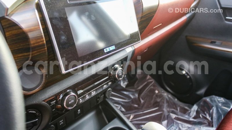 Big with watermark toyota hilux arusha import dubai 8908