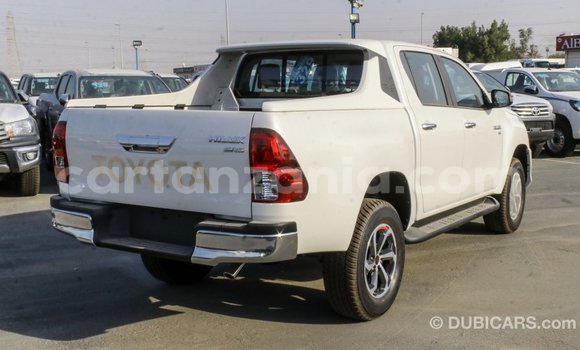 Nunua Imported Toyota Hilux Nyeupe Gari ndani ya Import - Dubai nchini Arusha Nunua Imported Toyota Hilux Nyeupe Gari ndani ya Import - Dubai nchini Arusha
