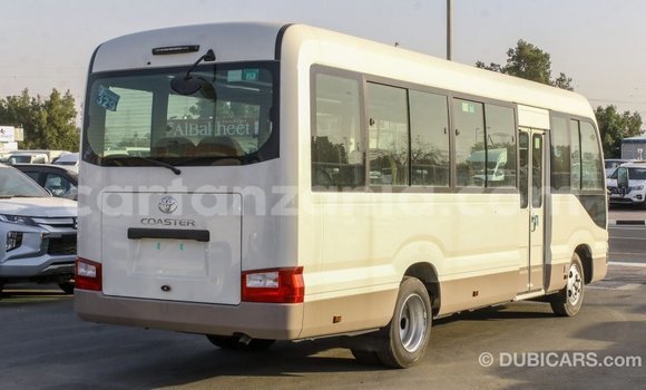 Nunua Imported Toyota Coaster Nyeupe Gari ndani ya Import - Dubai nchini Arusha Nunua Imported Toyota Coaster Nyeupe Gari ndani ya Import - Dubai nchini Arusha