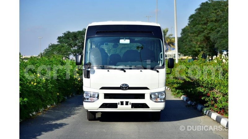 Big with watermark toyota coaster arusha import dubai 9275