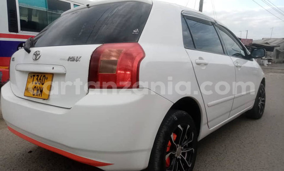 Buy Used Toyota Runx White Car in Dar es Salaam in Dar es Salaam Buy Used Toyota Runx White Car in Dar es Salaam in Dar es Salaam