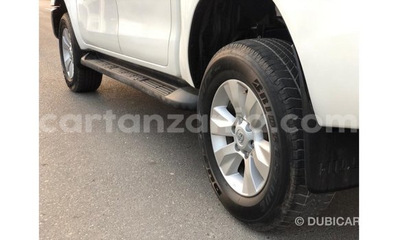 Nunua Imported Toyota Hilux Nyeupe Gari ndani ya Import - Dubai nchini Arusha Nunua Imported Toyota Hilux Nyeupe Gari ndani ya Import - Dubai nchini Arusha